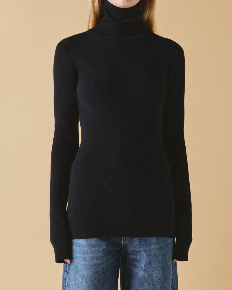 Elongated Compact Knit Top